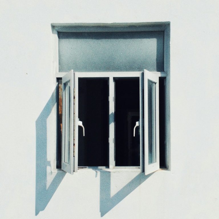 Casement windows on a white house