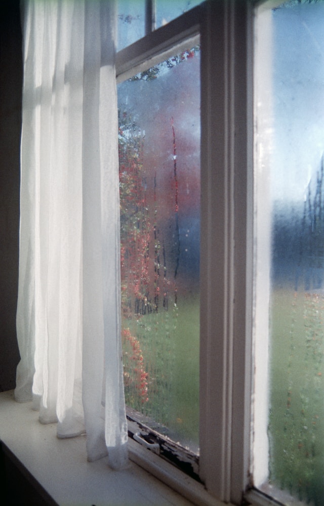 A window showing condensation during the day