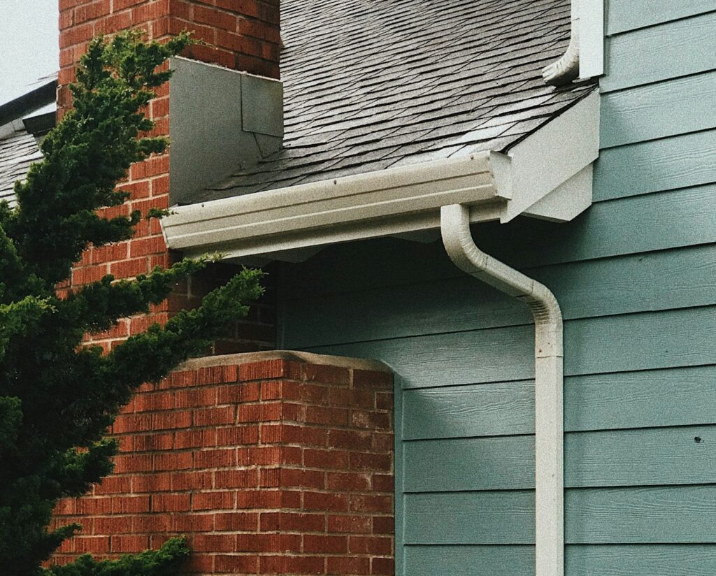 eavestrough on the side of a green house
